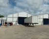 naves industriales en alquiler naves industriales Santo Domingo parque industrial El Higüero alquiler de naves logísticas acceso a puerto Caucedo acceso a puerto Haina almacenes industriales en renta naves con patio de maniobra naves cerca del aeropuerto renta de naves en zona industrial industrial warehouses for lease warehouses near El Higüero Airport Santo Domingo industrial park logistics warehouses for rent access to Caucedo Port access to Haina Port warehouses with truck yard industrial space for rent Dominican Republic ready-to-occupy industrial buildings warehouses with office space